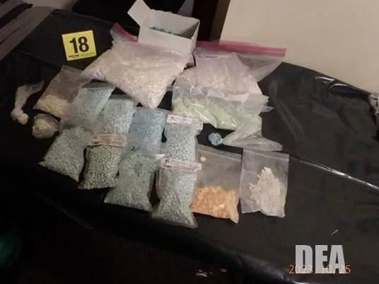 Bags of counterfeit pills seized by the U.S. DEA; many of these tablets contained fentanyl or other illicit substances instead of the claimed medication.